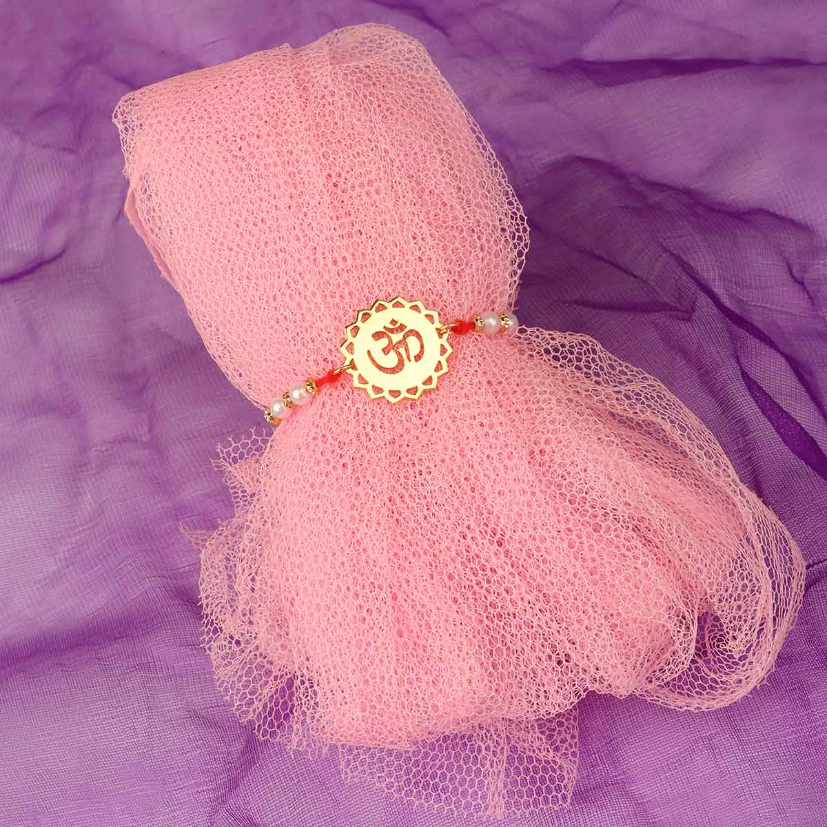 Divine Om Metal Rakhi With Pearl Beads